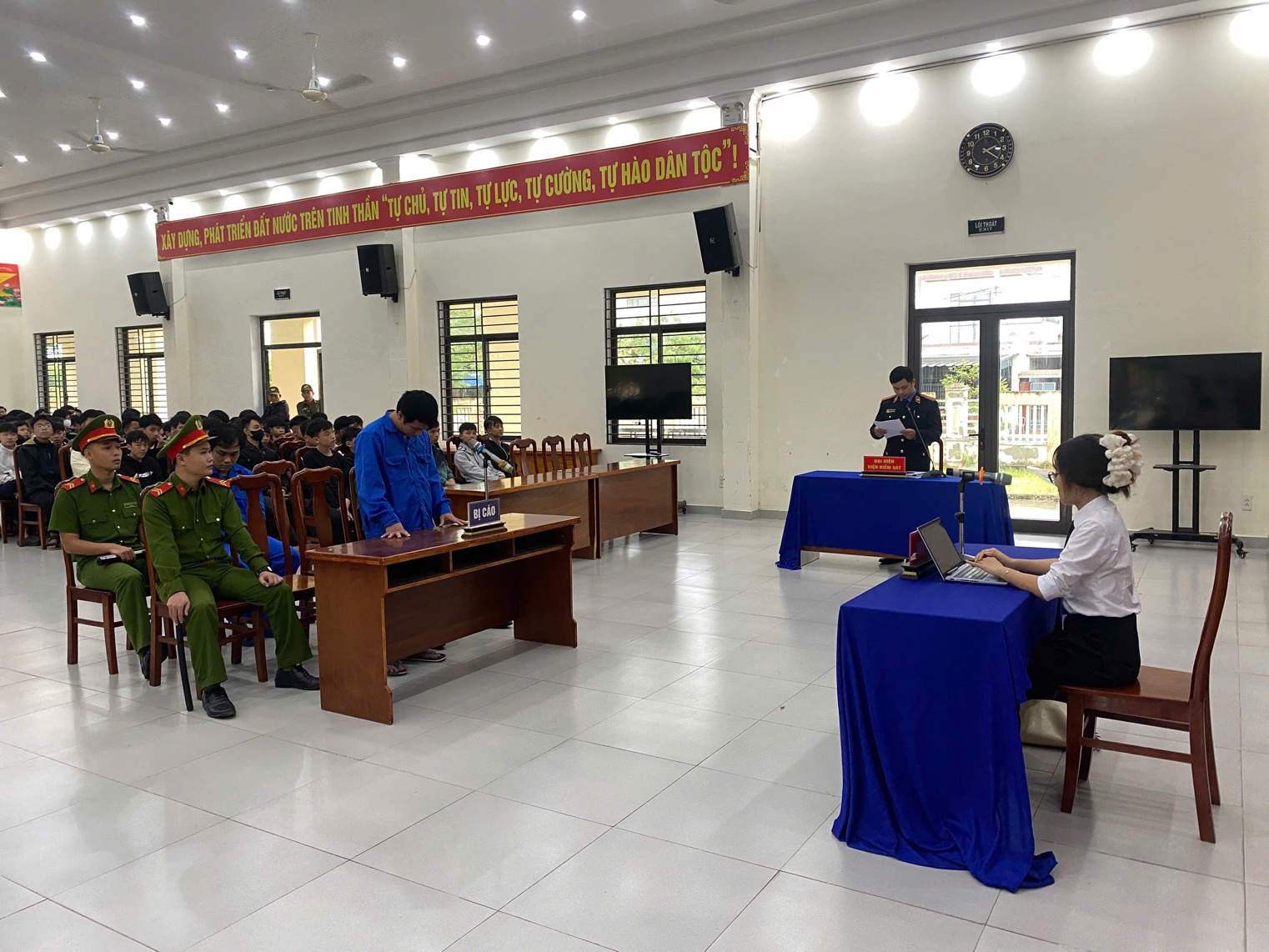 '''A group of people in a room
AI-generated content may be incorrect.'''