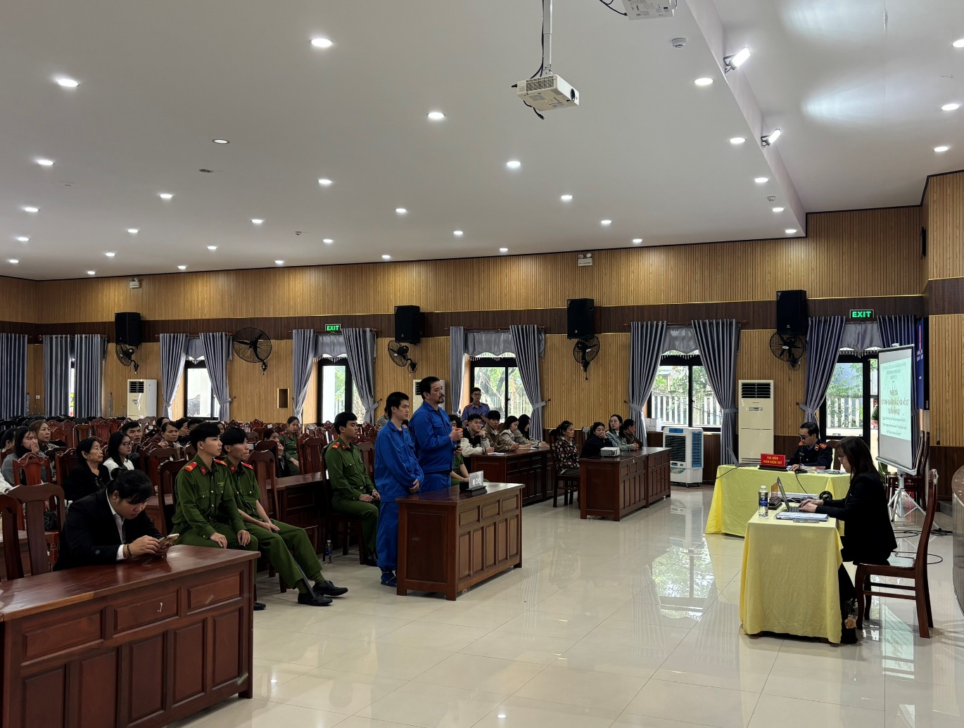 ''''A group of people in a room

AI-generated content may be incorrect.''''