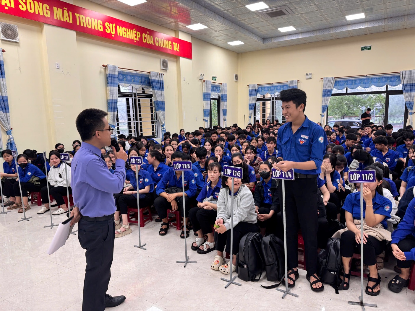 Description: D:\KHU VỰC 7\Chuyên mục tuyên truyền\Năm 2026\Phiên tòa giả định\z7292694608885_a5db6a7d8dea76c65e2720212fda2d0e.jpg