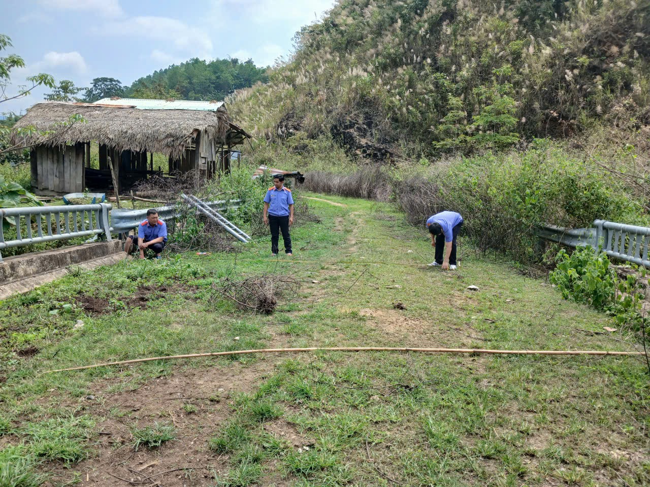 ''''A group of people working in a field

AI-generated content may be incorrect.''''